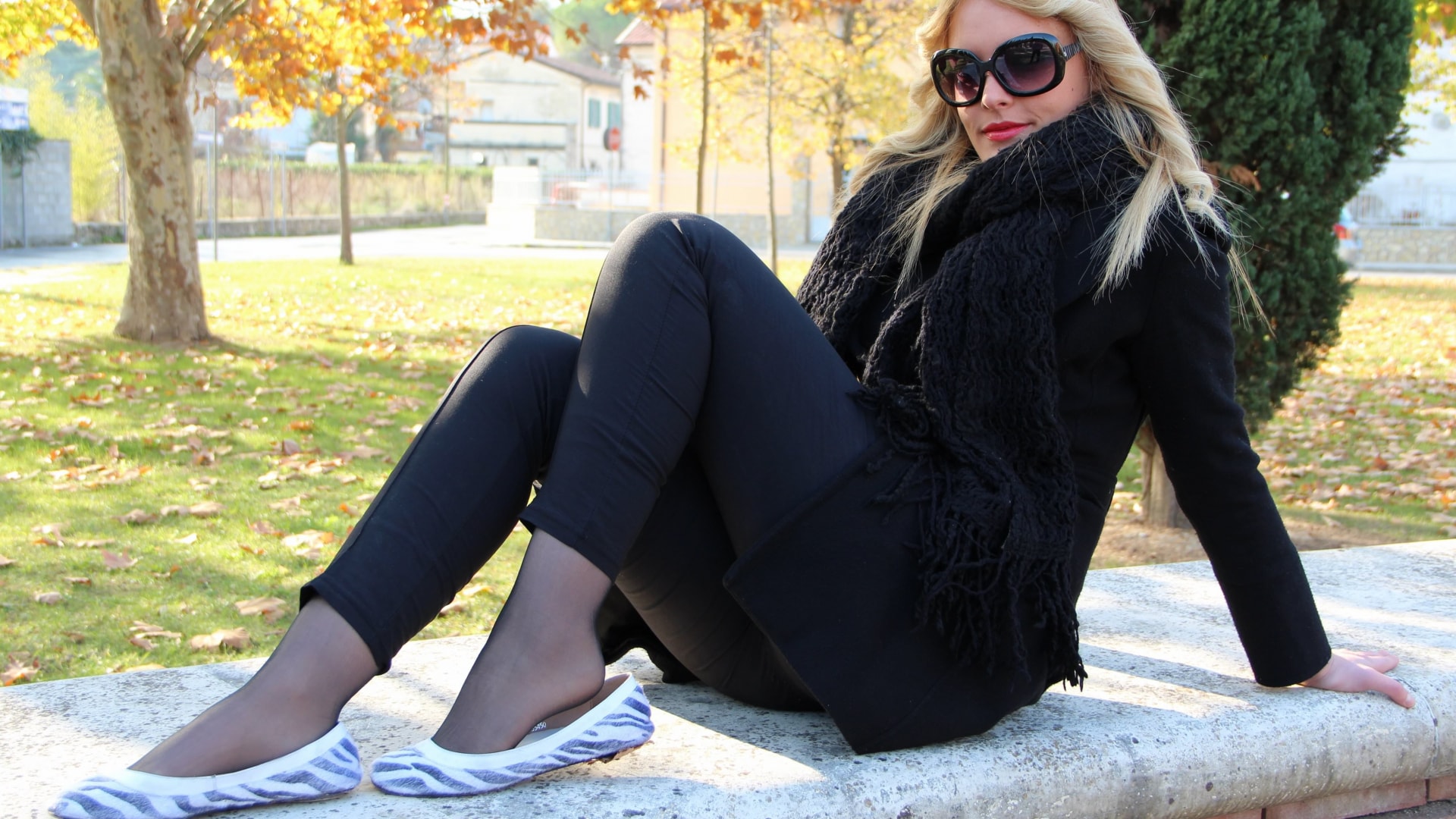 Dollface Christelle showing off her nyloned feet outdoors